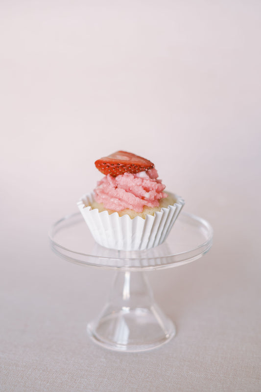 vanilla cupcake with strawberry buttercream frosting